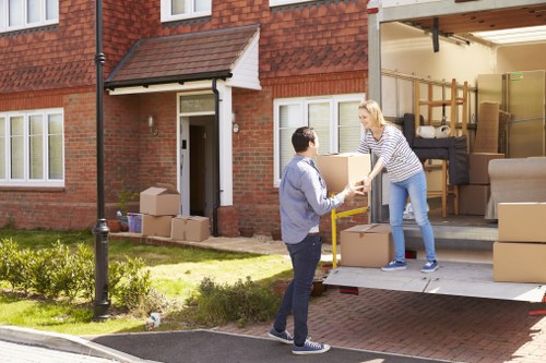 Packed household boxes and furniture ready for a home move in Ickenham