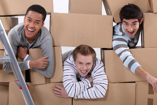 Packing and loading items into a moving van in Ickenham
