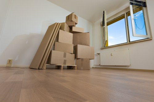 Careful loading of household items by movers in Ickenham