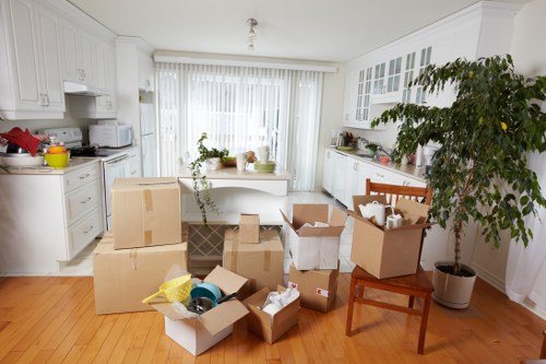 Professional movers handling furniture in Ickenham