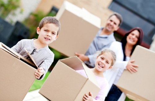 Loading household furniture into a removals van in Ickenham