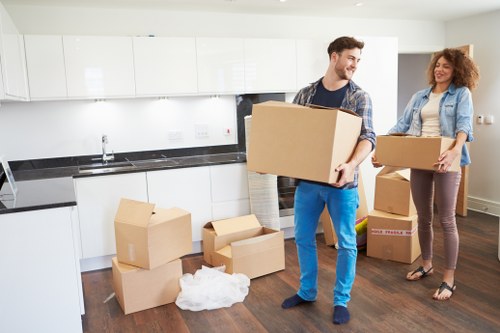 Packed boxes and furniture ready for loading during a house move in Ickenham