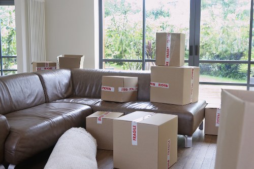 Furniture and boxes being loaded into a moving truck in Ickenham